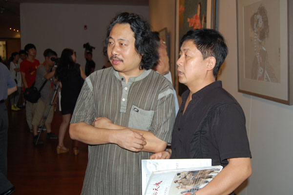 著名画家贾广健与《艺术天成》总编辑杨焦点合影
