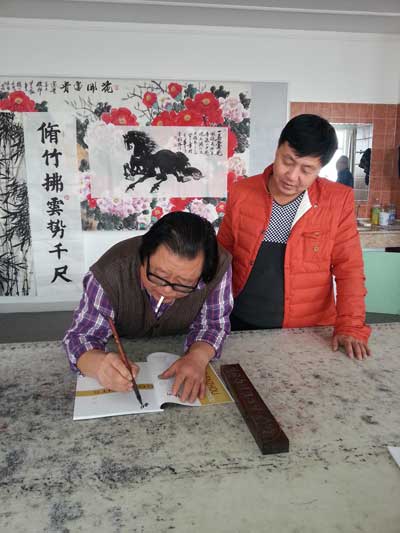 著名书画家刘泽与《艺术天成》总编辑杨焦点合影