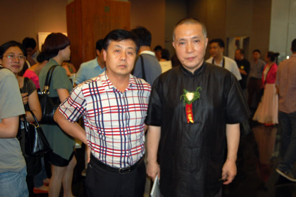著名画家周京新与总编杨焦点合影
