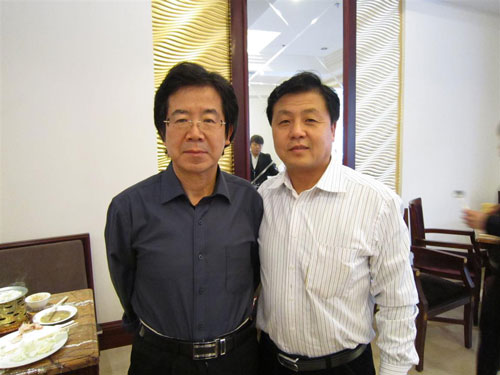 总编辑杨焦点与滕矢初合影