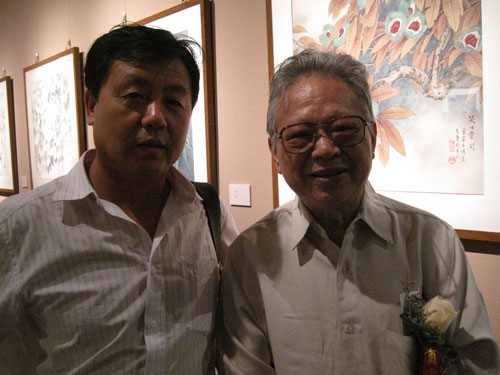 《艺术天成》杂志社总编杨焦点与著名画家姚治华合影 《艺术天成》杂志社总编杨焦点与著名画家姚治华合影