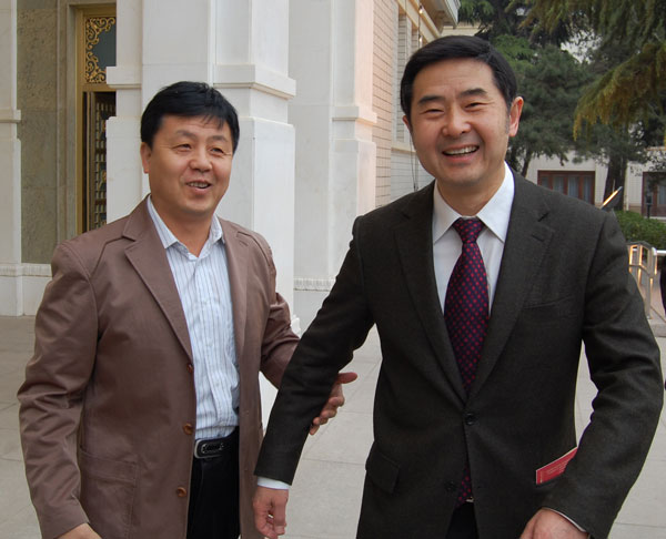 罗杨与《艺术天成》杂志总编杨焦点合影(于展览现场)